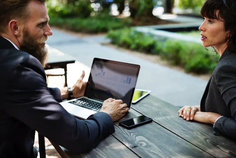 Meeting at a bench - Who To Talk To About Selling Your House